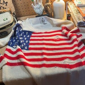 Unif flag v neck  never worn no tags